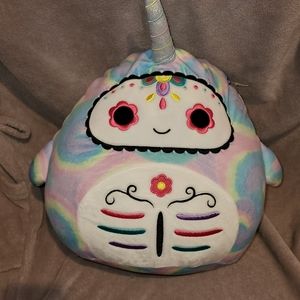 Igor the Narwhal is a tie-dye Squishmallow from the Day of the dead squad